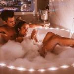 Share a romantic bath with your high end escort